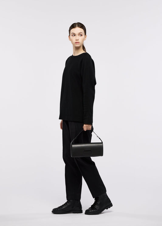 A model wears the GOOD GOODS ISSEY MIYAKE BOX box-handbag-silver-2.