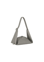 A detail shot of the GOOD GOODS ISSEY MIYAKE LEAF handbag.
