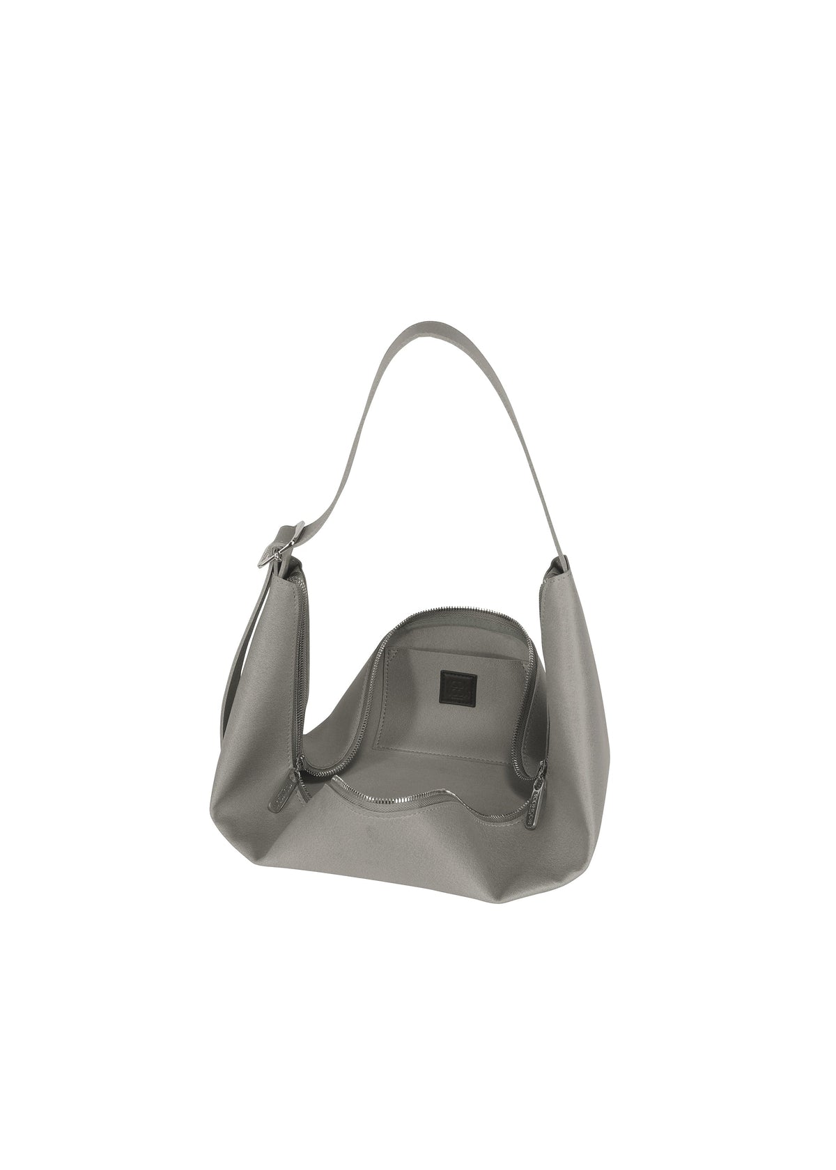 A detail shot of the GOOD GOODS ISSEY MIYAKE LEAF handbag.