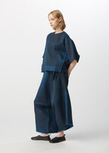 A model wears the HAAT  SQUARE GRADATION trousers