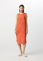 A model wears the HAAT  KYO CHIJIMI SQUARE SPIRAL dress