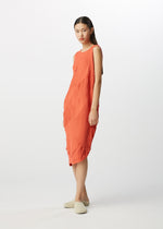 A model wears the HAAT  KYO CHIJIMI SQUARE SPIRAL dress