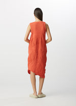 A model wears the HAAT  KYO CHIJIMI SQUARE SPIRAL dress