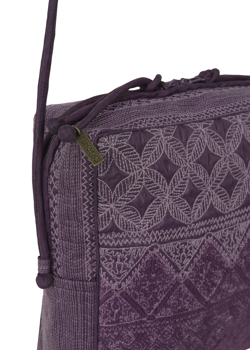 A detail shot of the HAAT CHENILLE VELOUR bag.