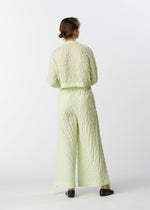 A model wears the HAAT KUMO trousers.