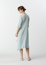 A model wears the HAAT KYO CHIJIMI MAY dress.