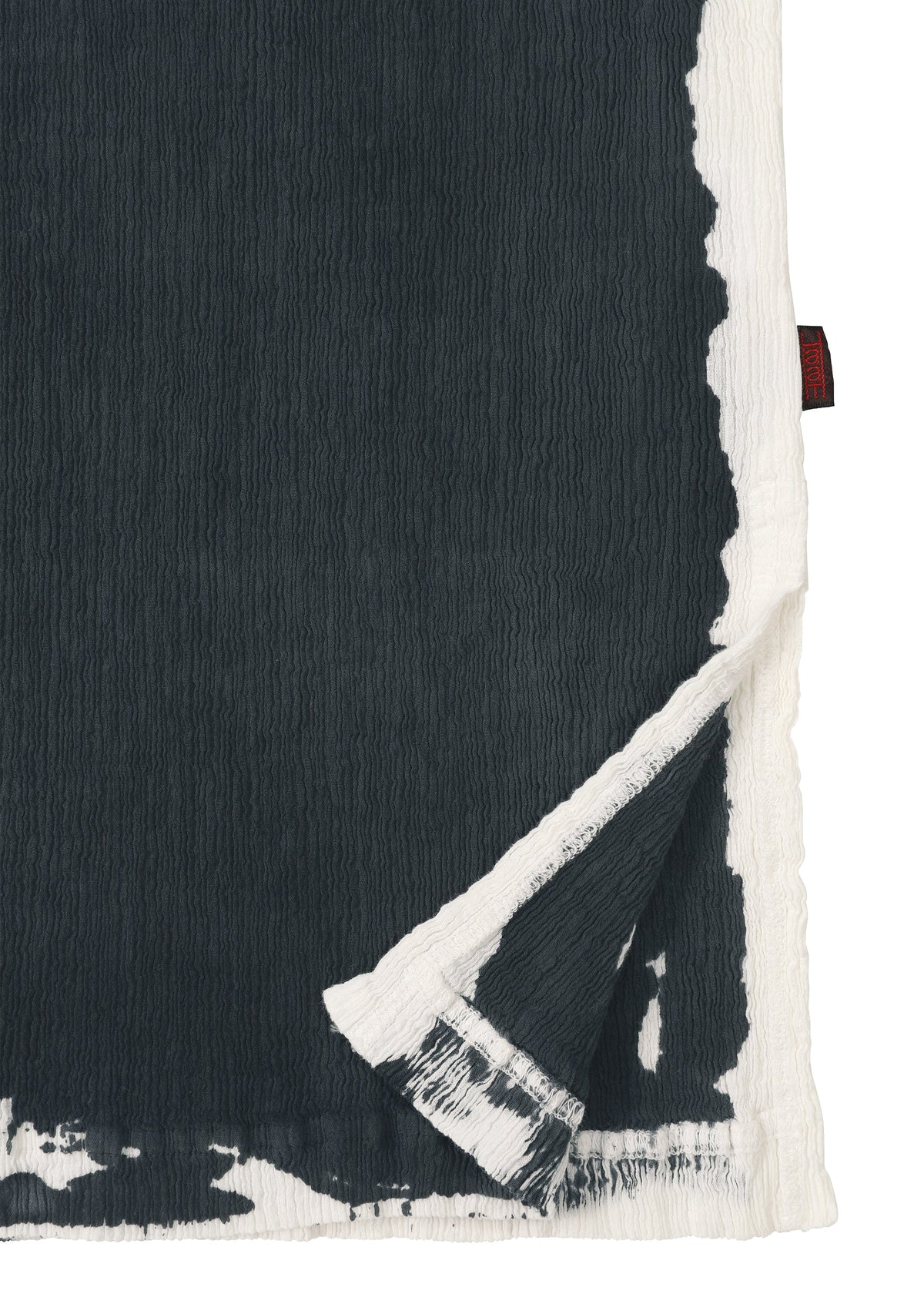 A detail shot of the HAAT KYO CHIJIMI OVER PRINT shirt.