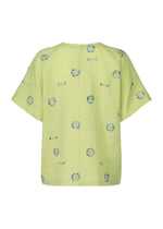 A detail shot of the HAAT KOMOREBI shirt.