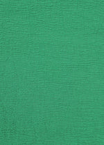 A detail shot of the HAAT KYO CHIJIMI 2WAY shirt.