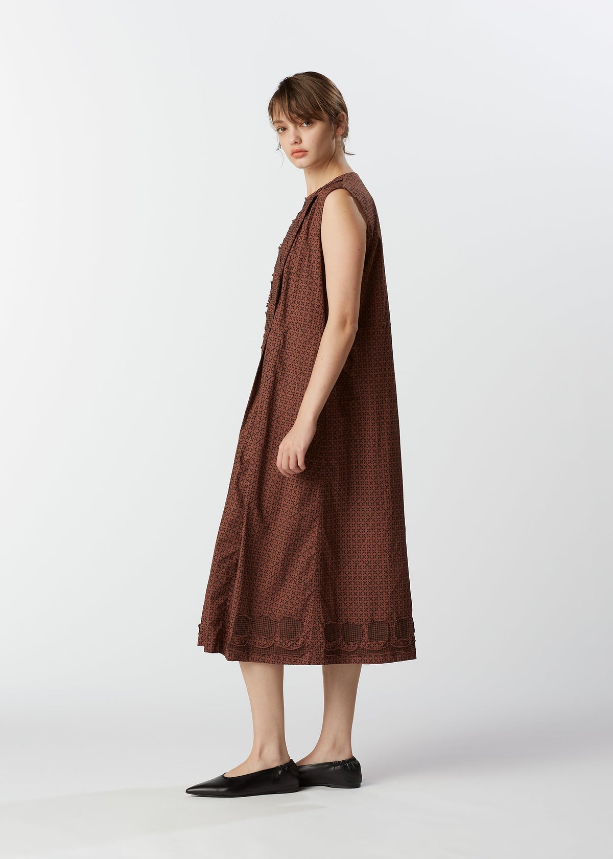 A model wears the HAAT ASSEMBLAGE dress.