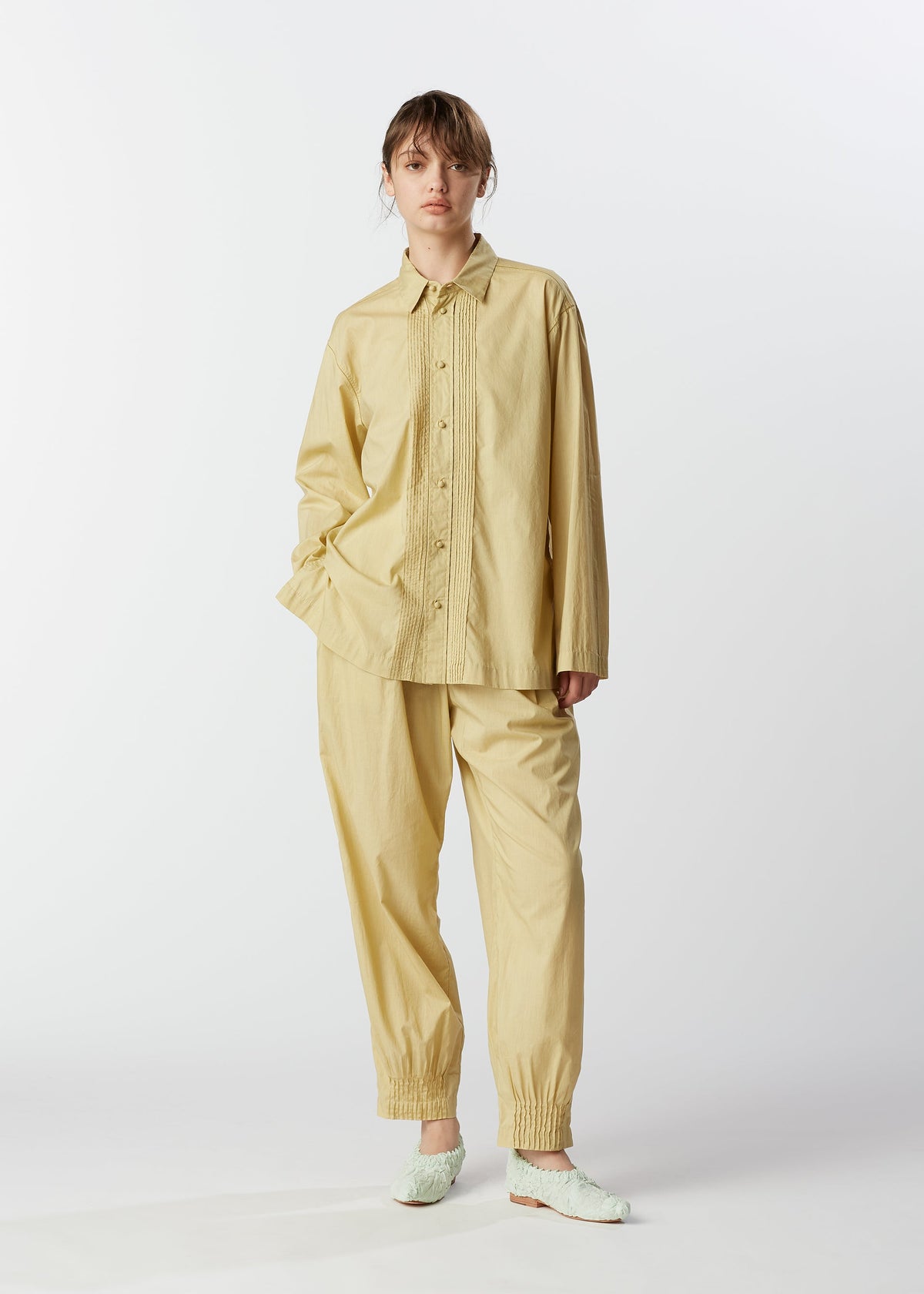 A model wears the HAAT BABY JALI shirt.
