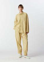 A model wears the HAAT BABY JALI shirt.