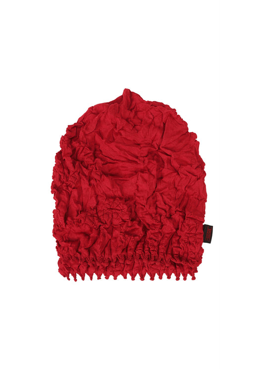 A product shot of the HAAT KUMO SHIBORI KNIT accessories in red (24).