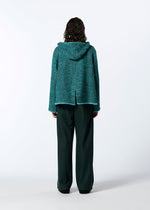 A model wears the HAAT ROVING NEP jacket.