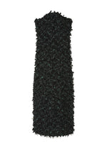 A detail shot of the HAAT RIBBON TWEED clothing.