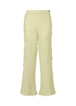 A product shot of the HAAT KYO CHIJIMI CUT LOOP trousers in pale yellow (50).