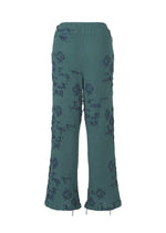 A detail shot of the HAAT KYO CHIJIMI CUT LOOP trousers.