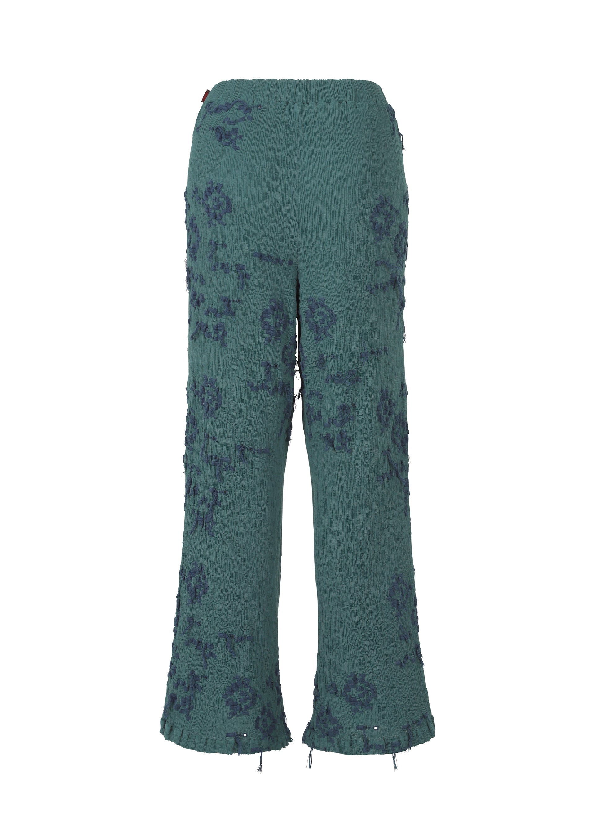 A detail shot of the HAAT KYO CHIJIMI CUT LOOP trousers.