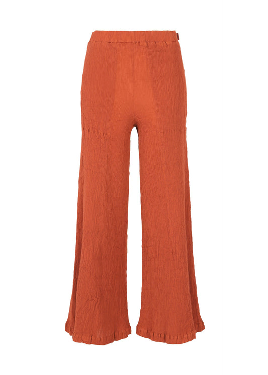 A product shot of the HAAT KYO CHIJIMI SEPTEMBER trousers in reddish brown (43).