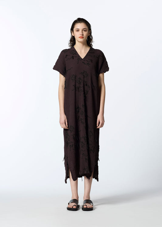 A model wears the HAAT KYO CHIJIMI CUT LOOP dress.