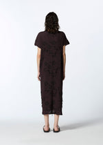 A model wears the HAAT KYO CHIJIMI CUT LOOP dress.