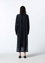 A model wears the HAAT PINTUCKING dress.