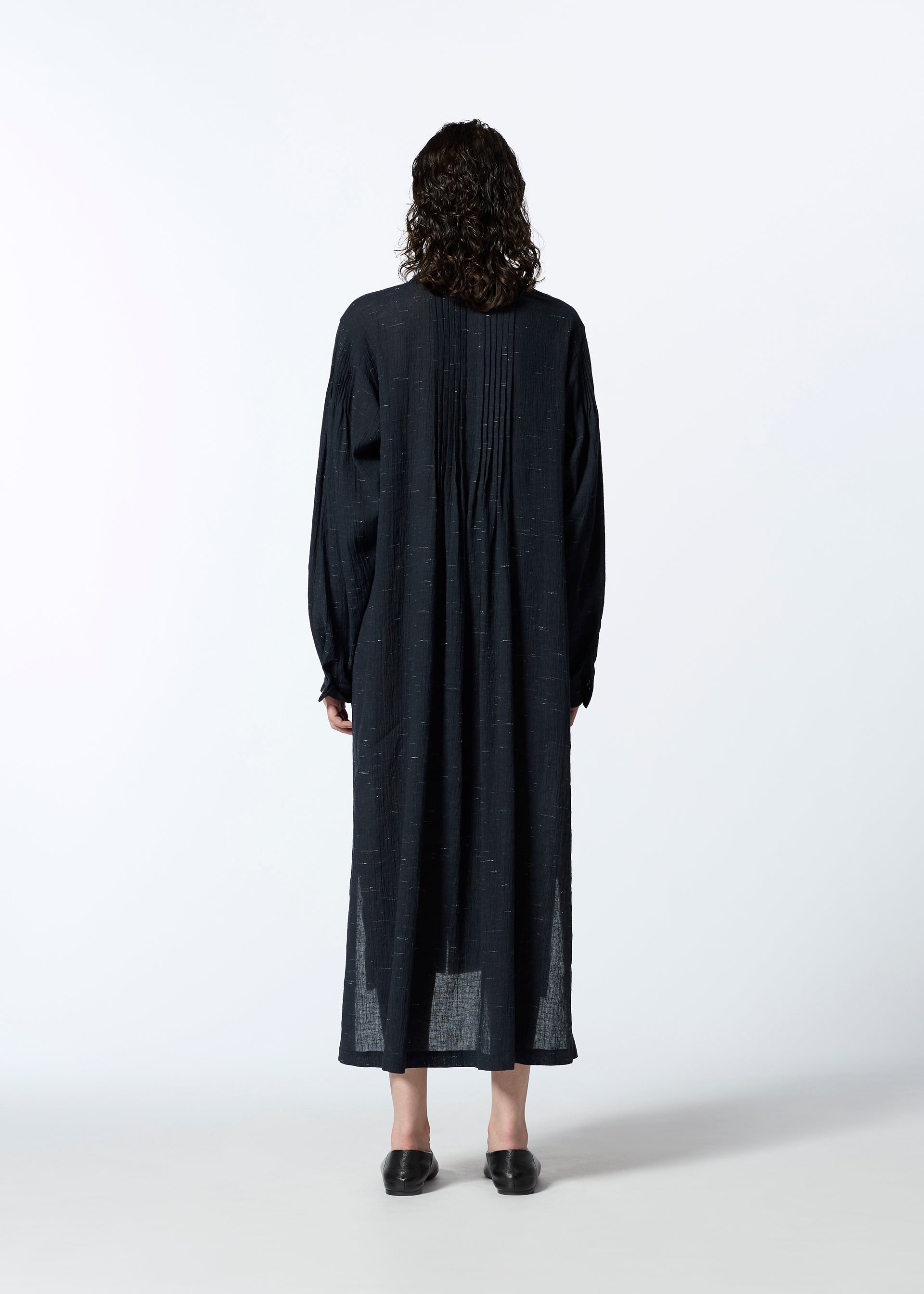 A model wears the HAAT PINTUCKING dress.