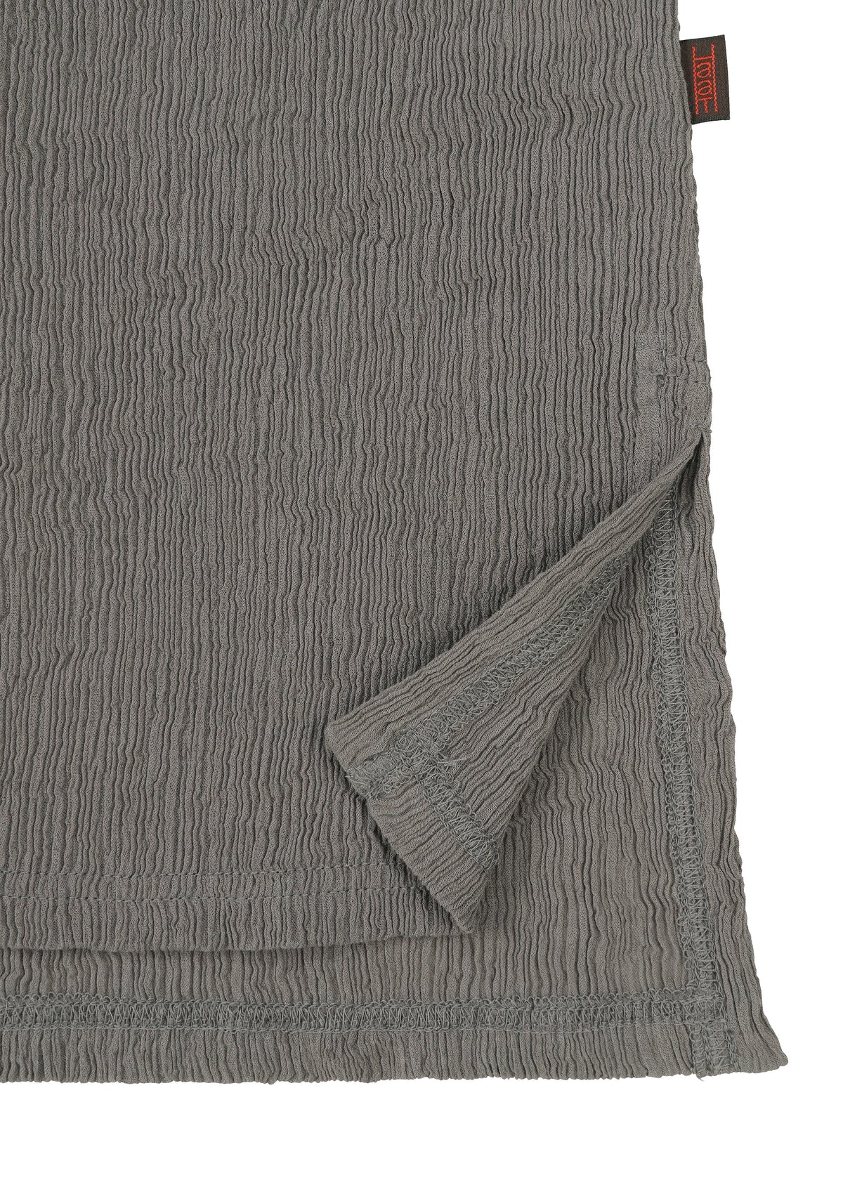 A detail shot of the HAAT KYO CHIJIMI COMBINATION shirt.