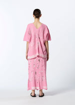 A model wears the HAAT KYO CHIJIMI FRIKAKE shirt.