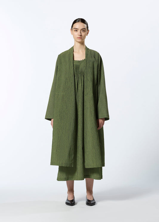 A model wears the HAAT LIGHT WEIGHT cardigan.