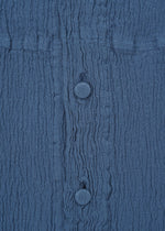 A detail shot of the HAAT KYO CHIJIMI 2WAY cardigan.