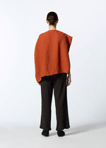 A model wears the HAAT KYO CHIJIMI SEPTEMBER tunic.