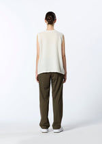 A model wears the HAAT REVERSIBLE BOTTOM trousers.