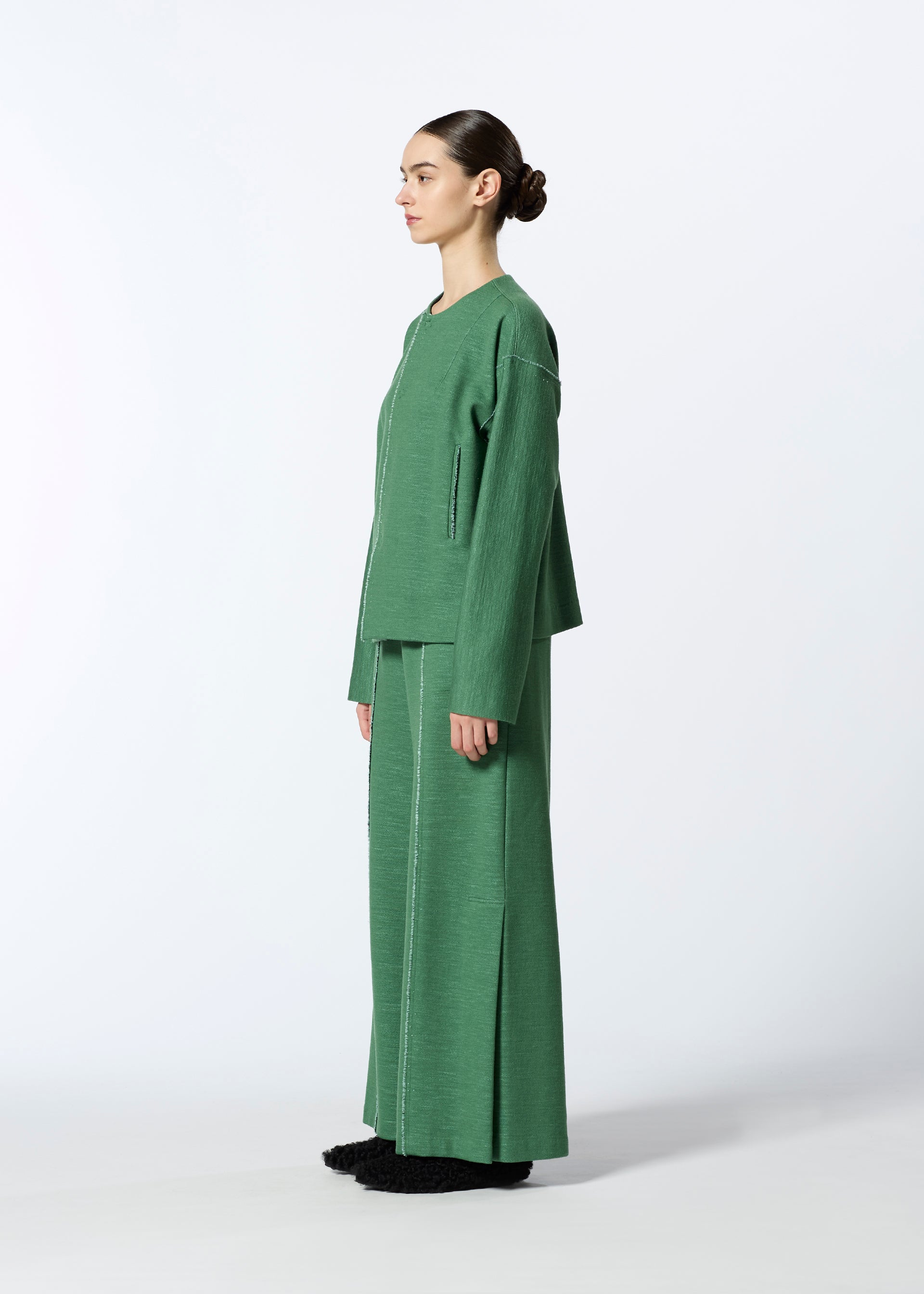 A model wears the HAAT EDGE LINE trousers.