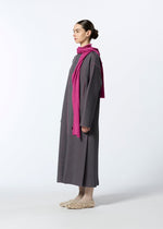 A model wears the HAAT EDGE LINE dress.