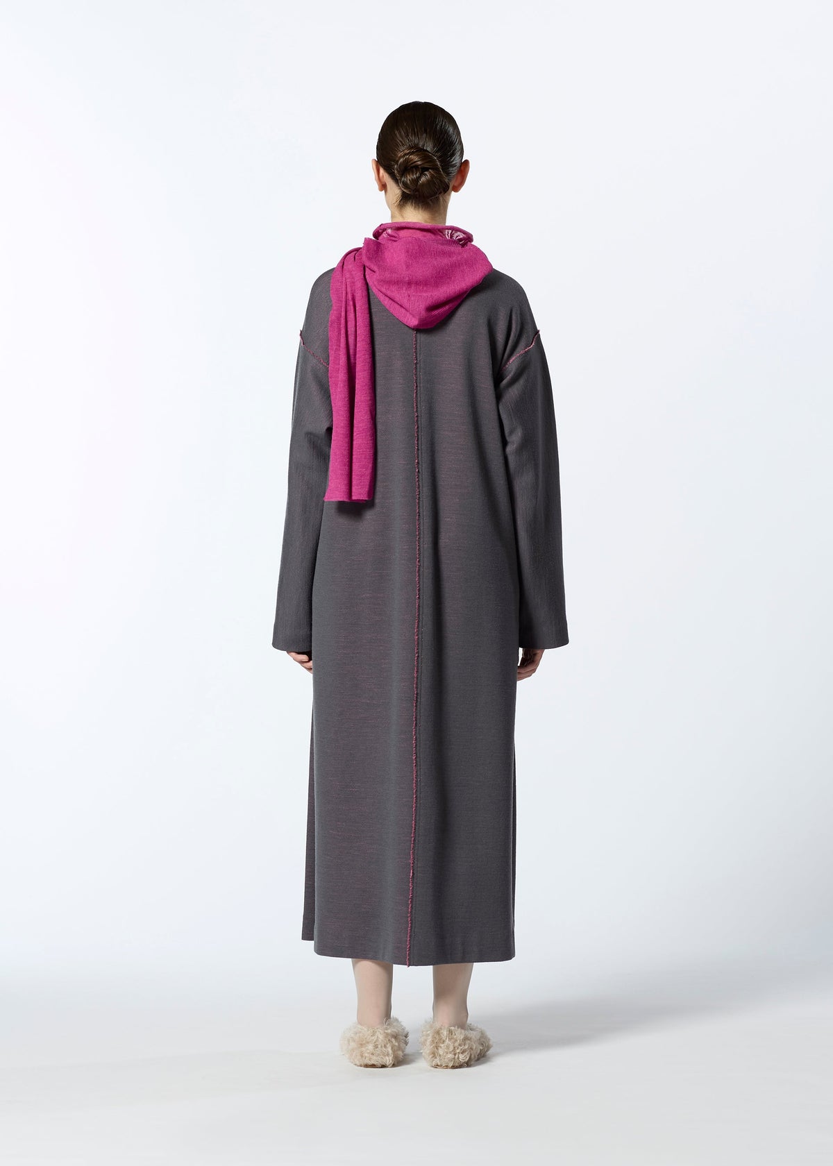 A model wears the HAAT EDGE LINE dress.