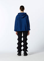 A model wears the HAAT RASCHEL ASSEMBLY cardigan.