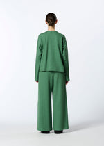 A model wears the HAAT EDGE LINE cardigan.