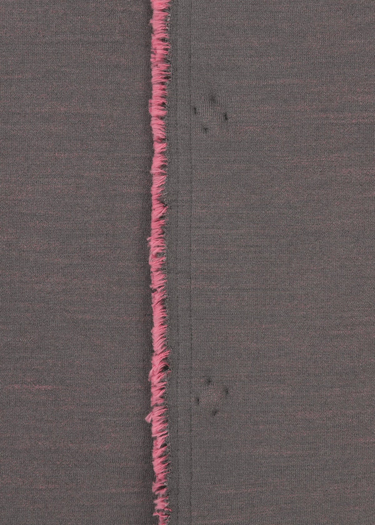 A detail shot of the HAAT EDGE LINE cardigan.