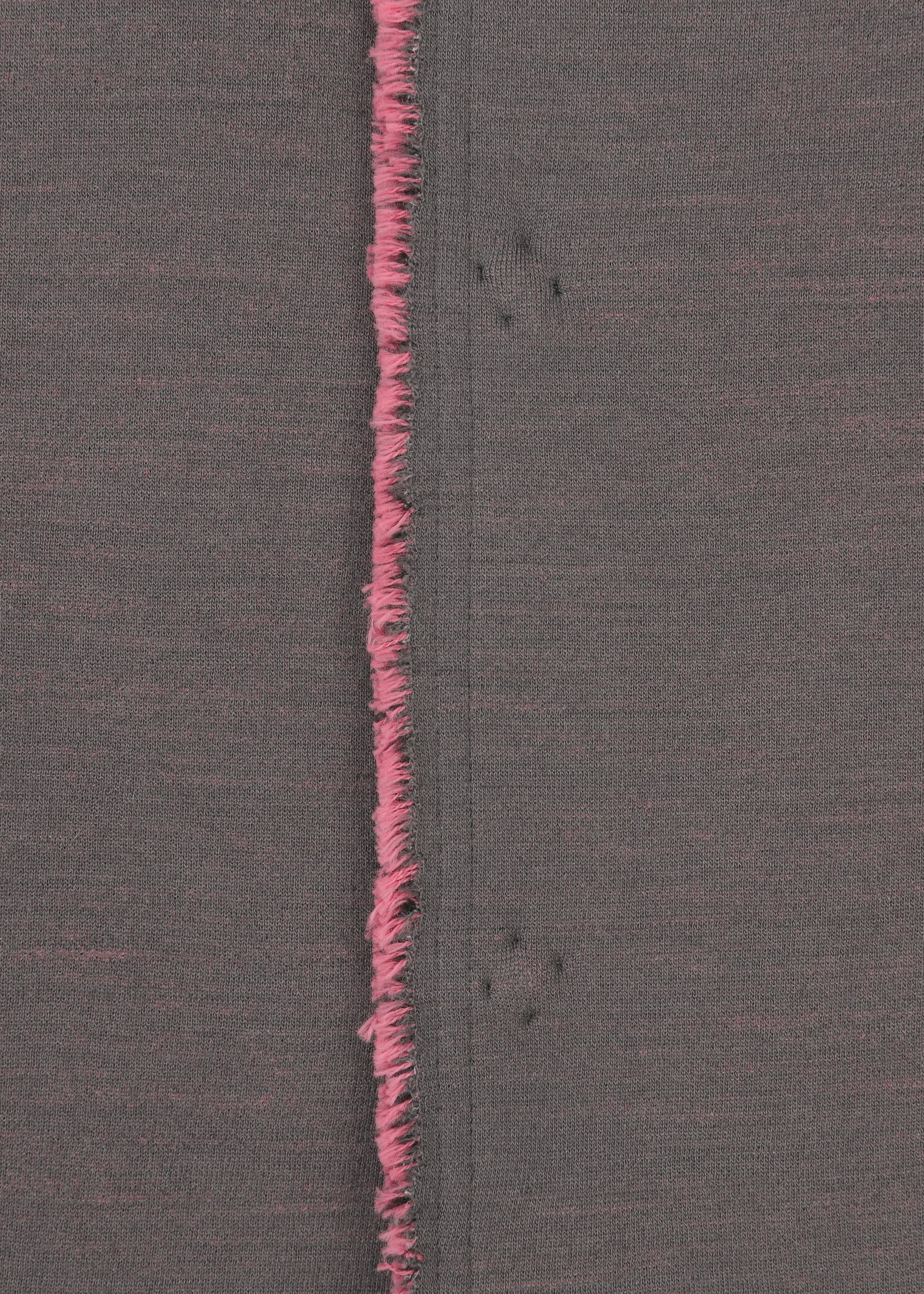 A detail shot of the HAAT EDGE LINE cardigan.