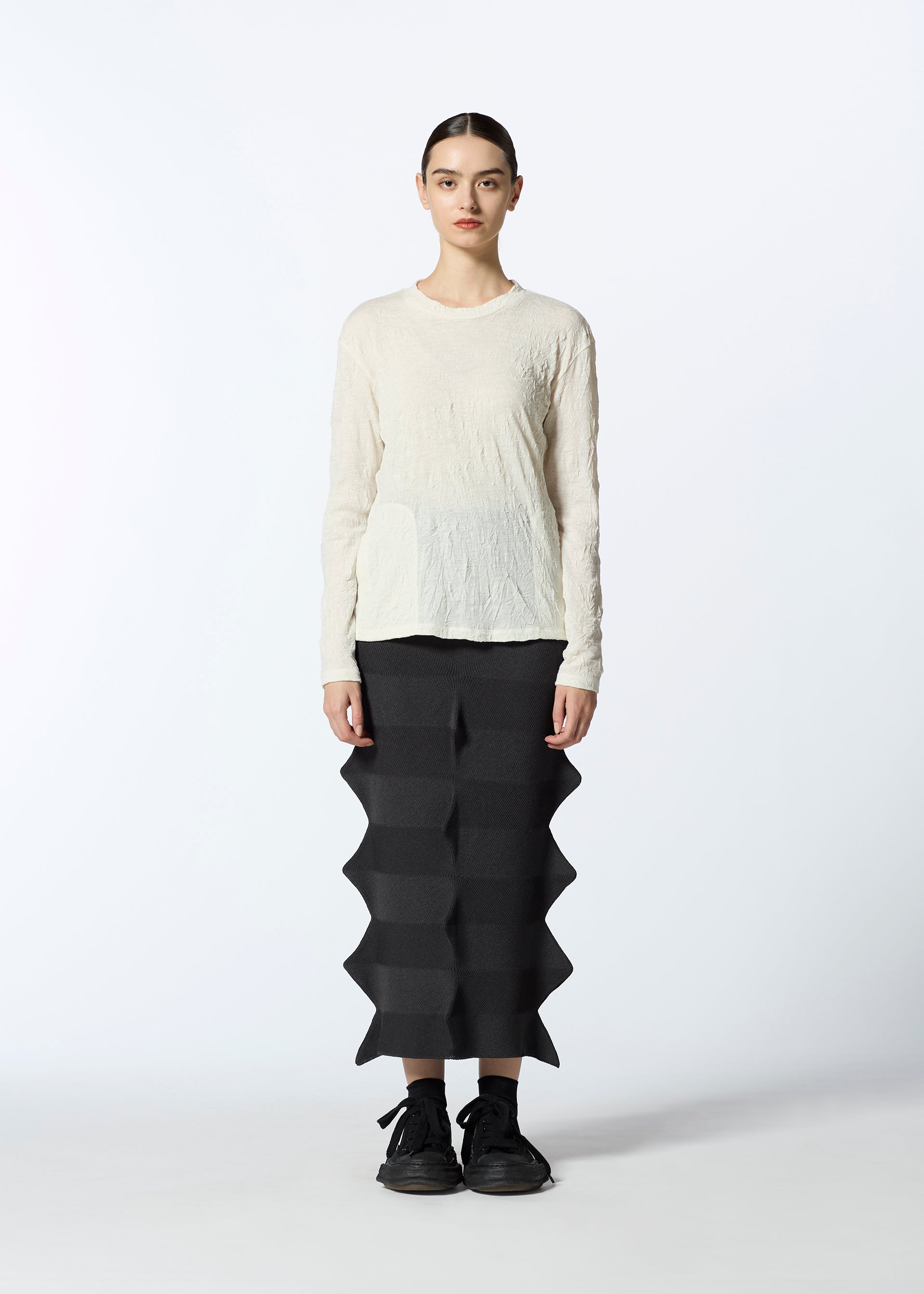 A model wears the HAAT 2001 FROM skirt.