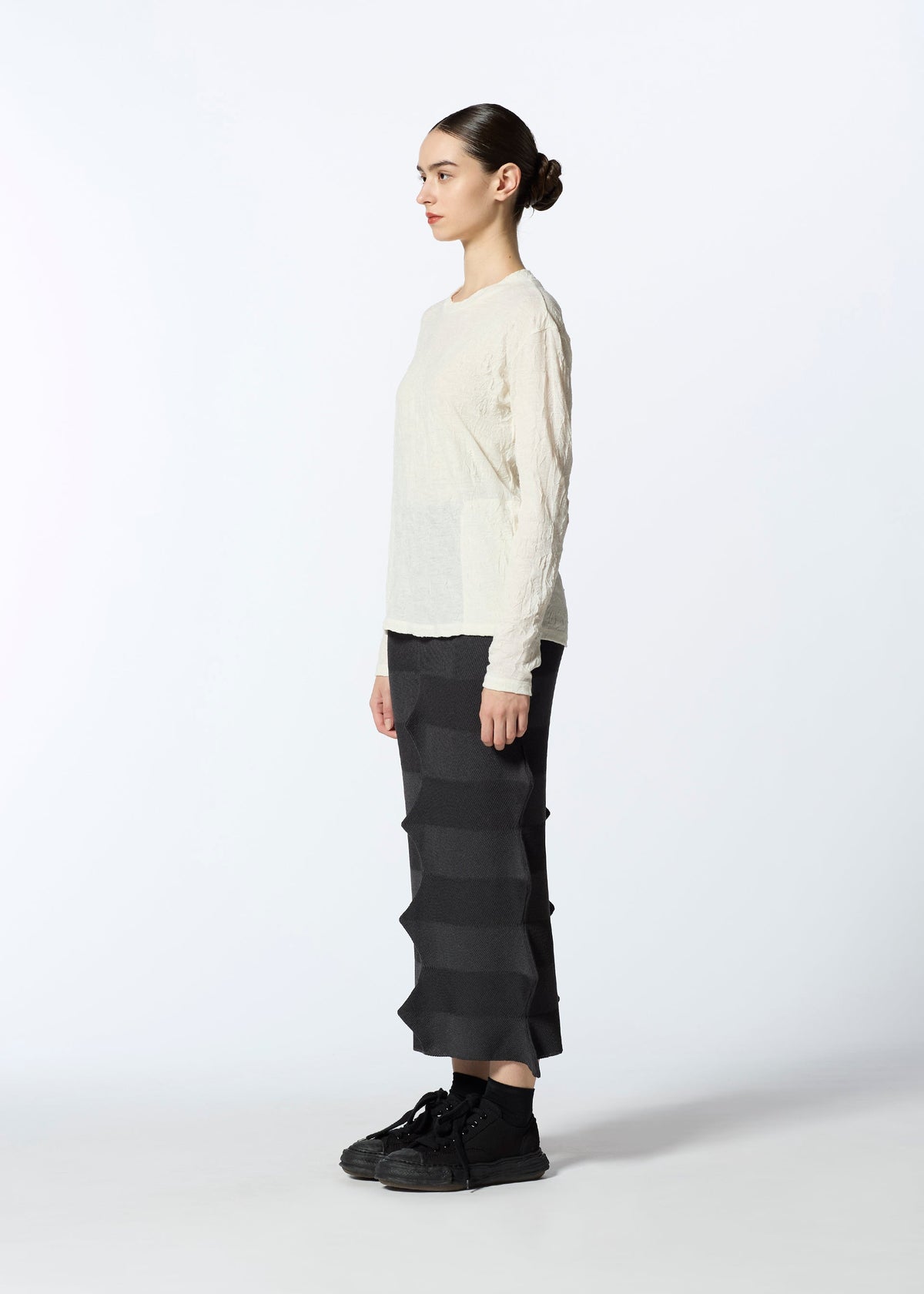 A model wears the HAAT 2001 FROM skirt.