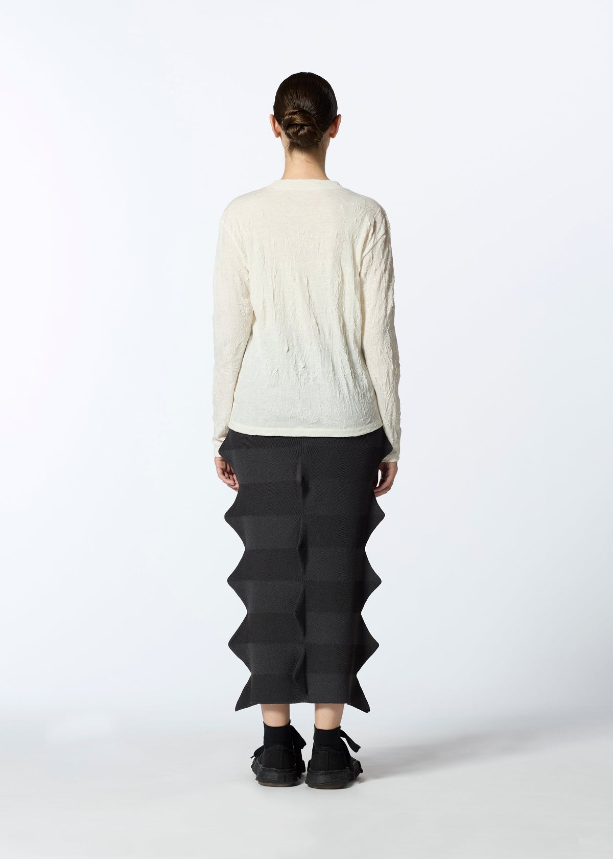 A model wears the HAAT 2001 FROM skirt.