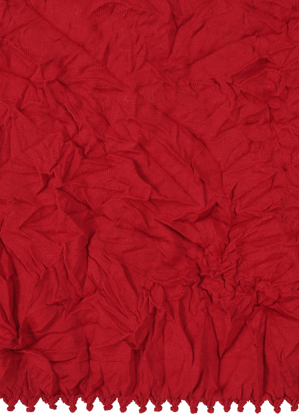 A detail shot of the HAAT KUMO SHIBORI KNIT clothing.