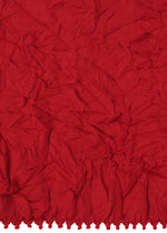 A detail shot of the HAAT KUMO SHIBORI KNIT clothing.