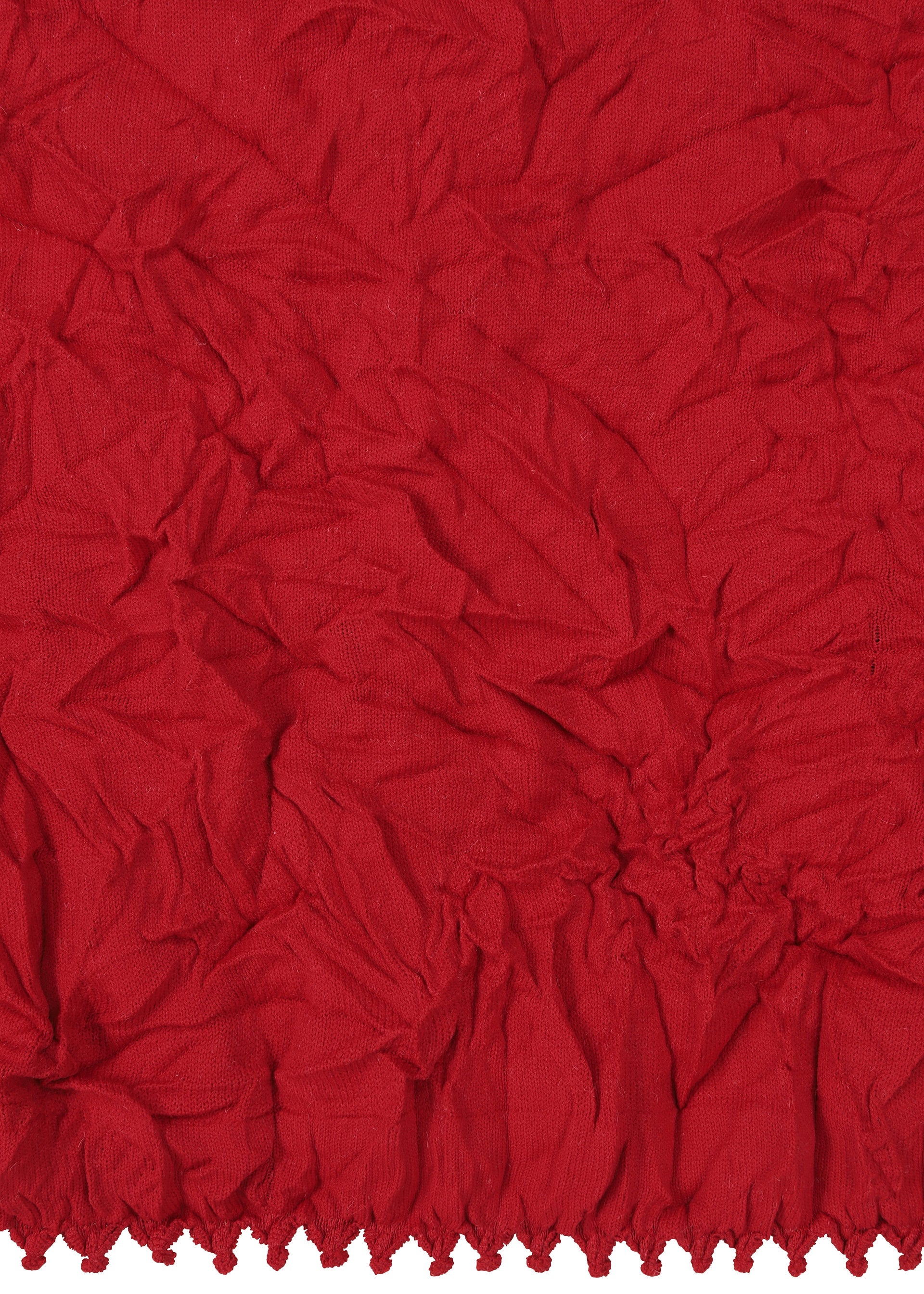 A detail shot of the HAAT KUMO SHIBORI KNIT clothing.