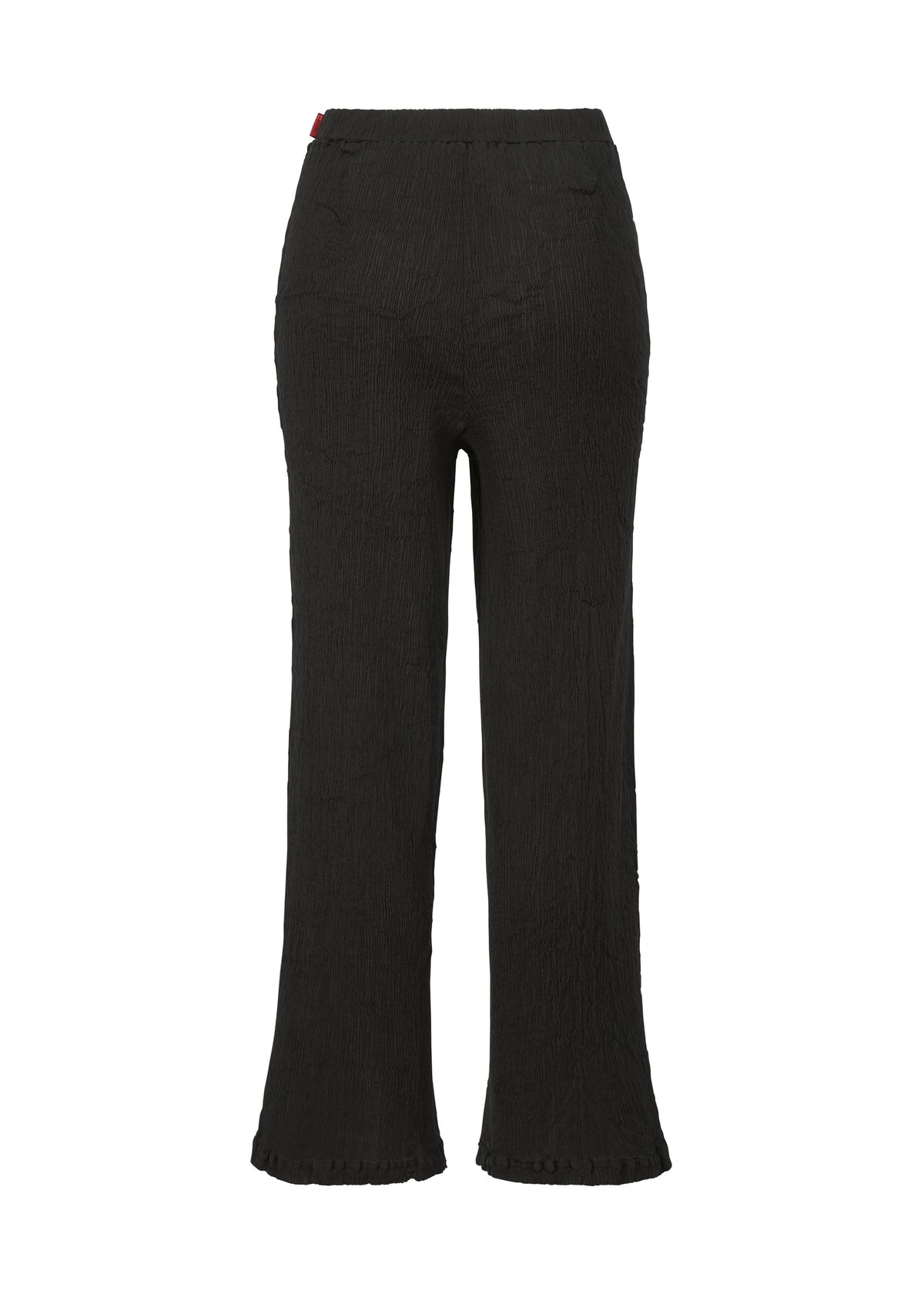 A detail shot of the HAAT  KYO CHIJIMI BASIC trousers