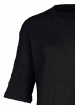 A detail shot of the HAAT  KYO CHIJIMI BASIC dress