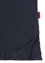 A detail shot of the HAAT  KYO CHIJIMI BASIC top