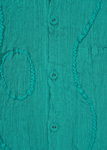 A detail shot of the HAAT KYO CHIJIMI EMB jacket.